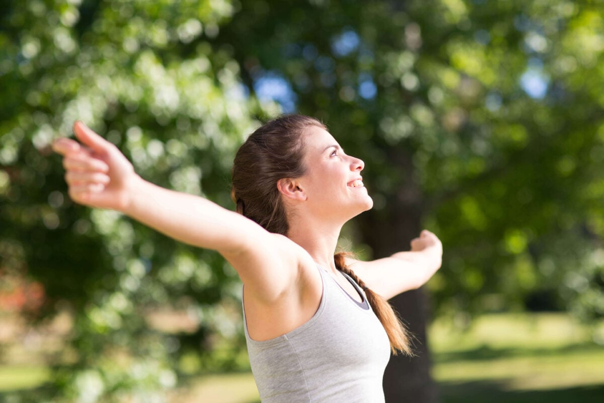 Healthy woman enjoying the nature